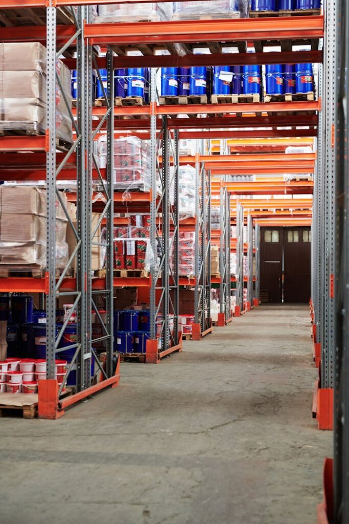 The Art of Drawing Readers In: Your attractive post title goes here Industrial warehouse interior with organized shelves stacked with packages and goods.